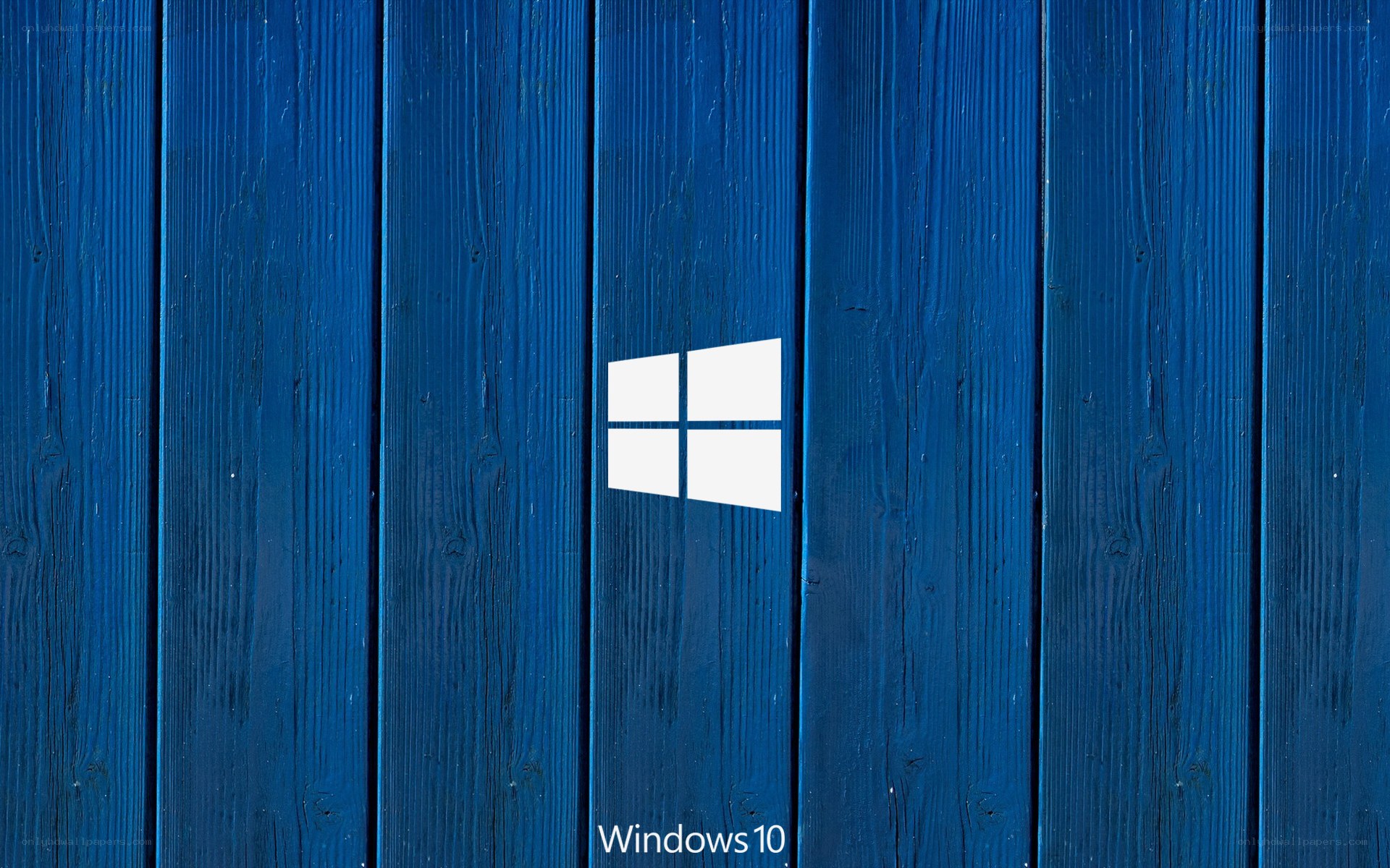 Windows 10 logo on blue wood