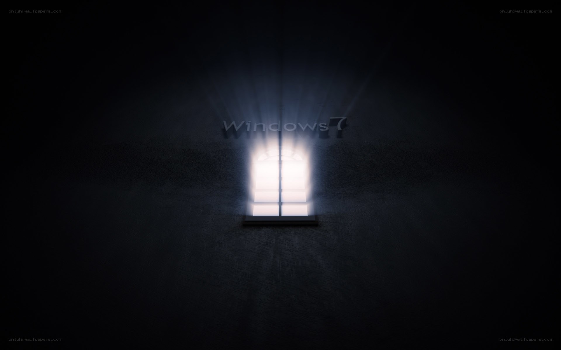 Windows 7 logo in dark room