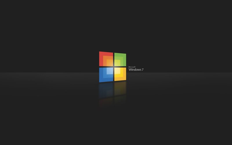 Windows 7 logo on dark background