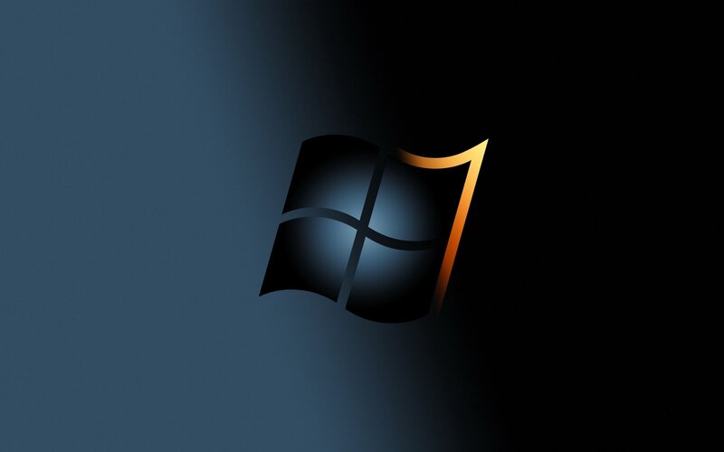 Windows 7 logo on dark background