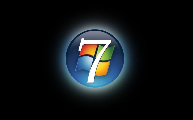 Windows 7 logo on dark background