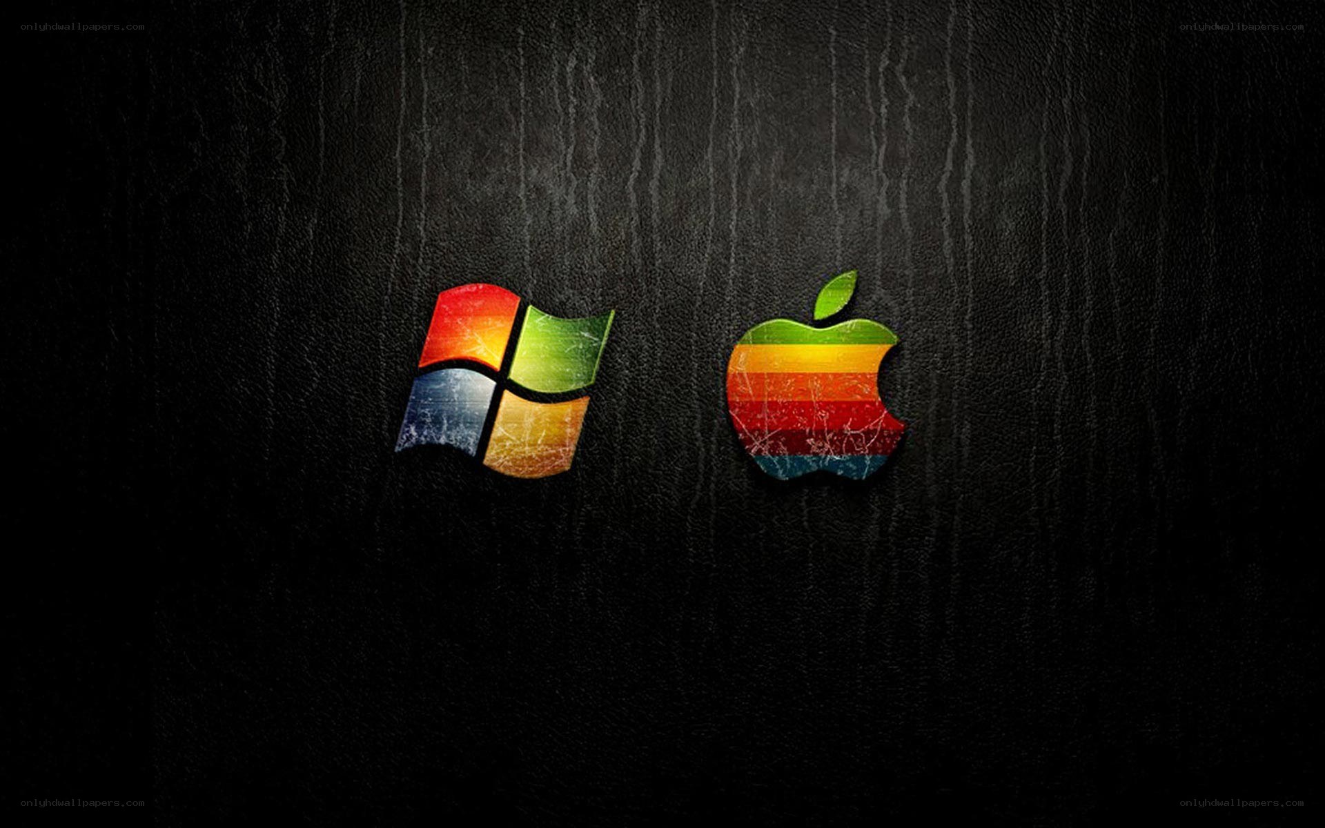 Windows and Apple logos on black leather