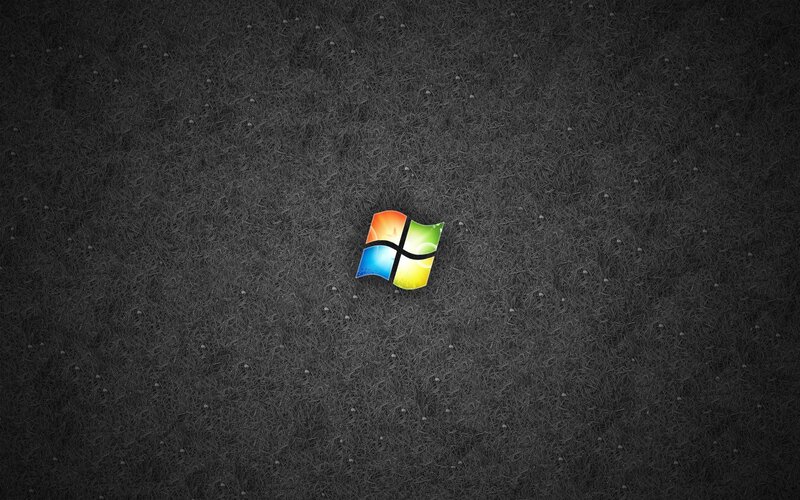 Windows logo on dark grass
