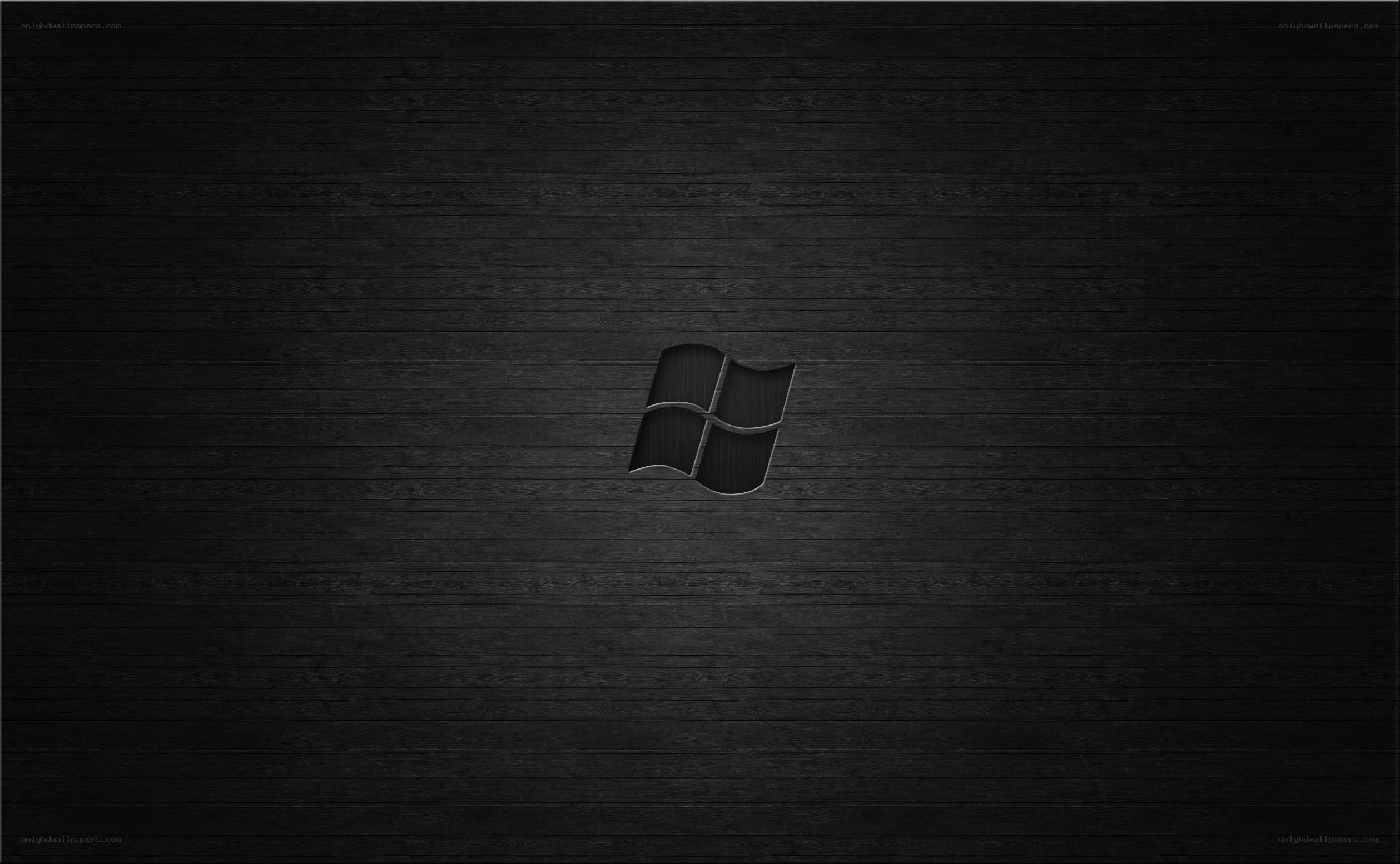Windows logo on dark wood