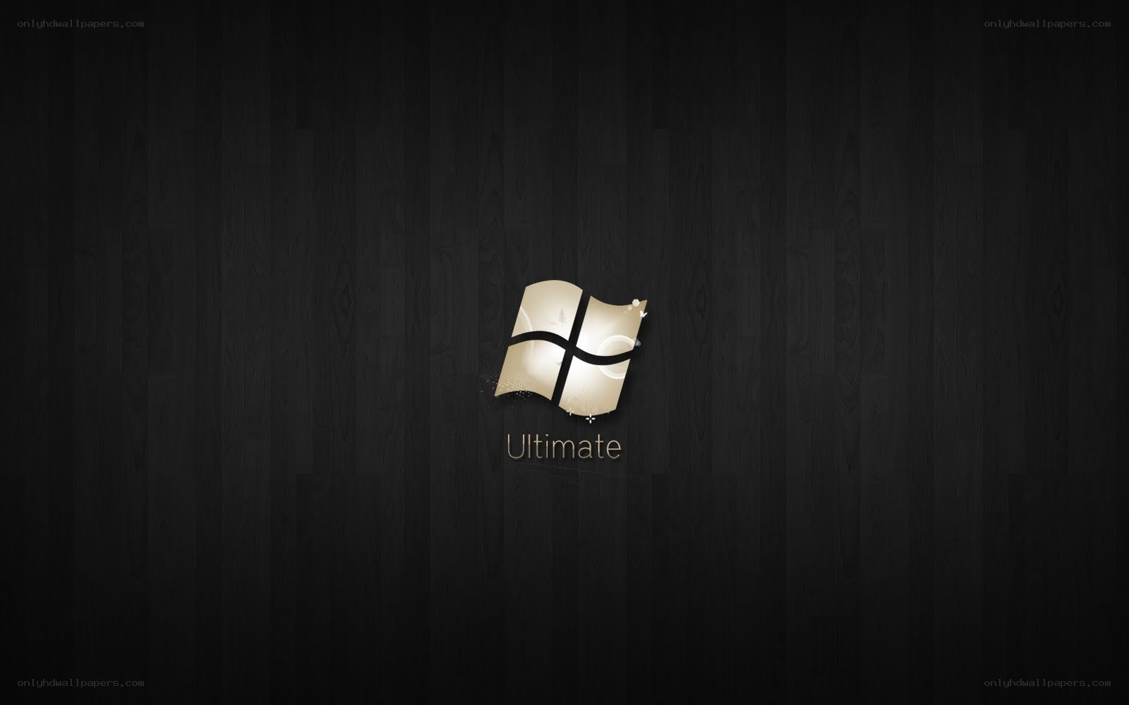 Windows Ultimate logo on dark wood