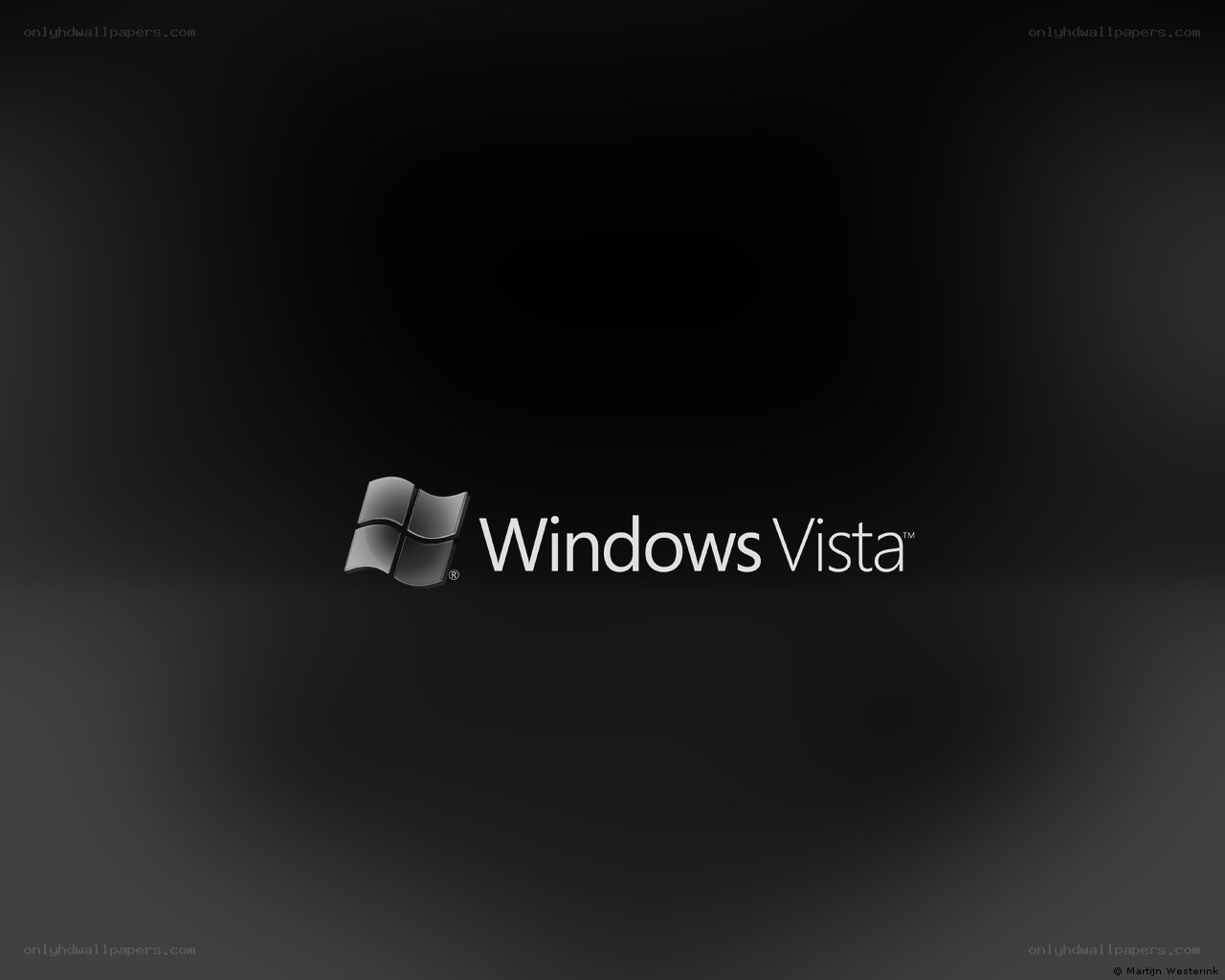 Windows Vista logo on dark background
