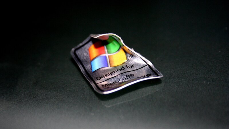 Windows XP sticker on dark surface