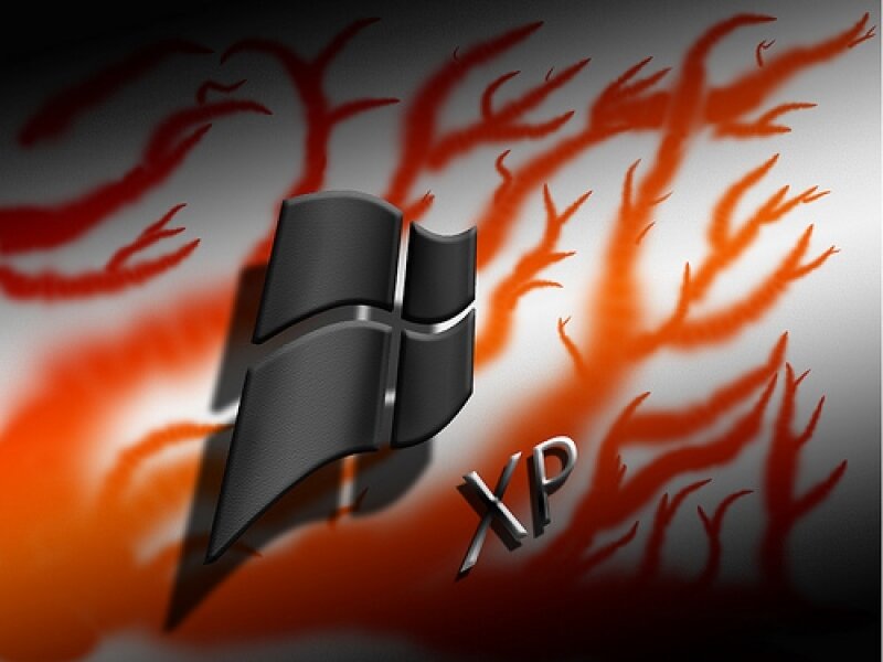 Windows XP with fiery background