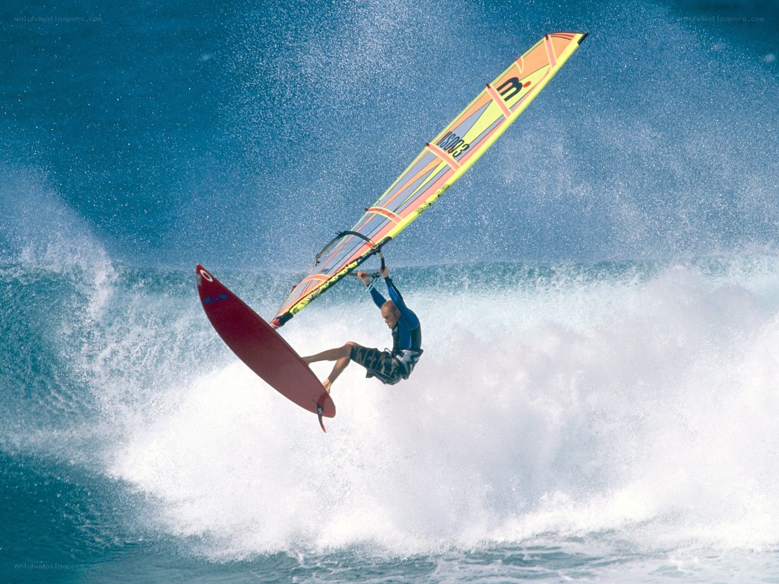 Windsurfer performing aerial maneuver