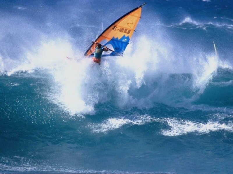 Windsurfer riding a wave