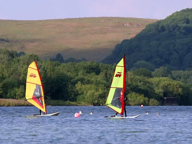 Windsurfing on a lake