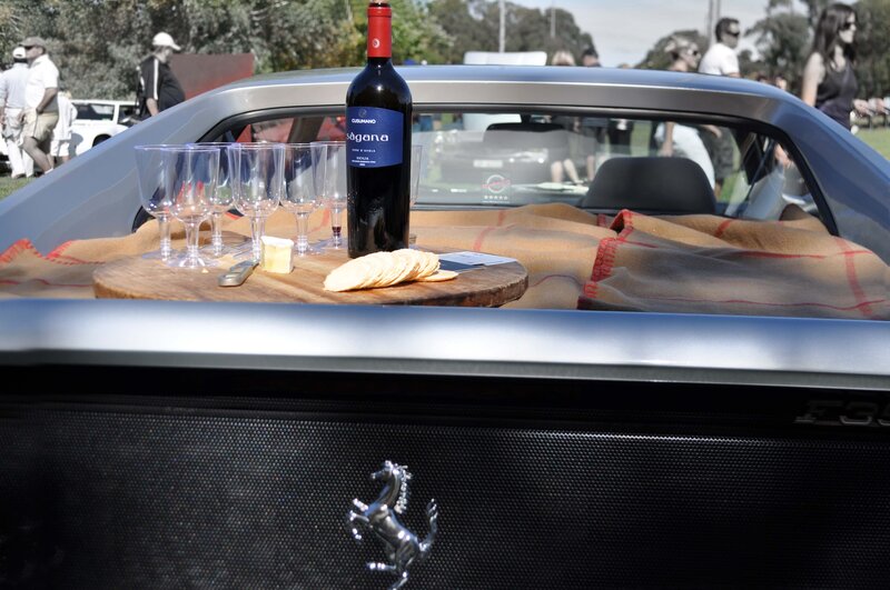 Wine and cheese on a car