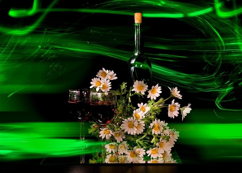 wine and daisies with green lights
