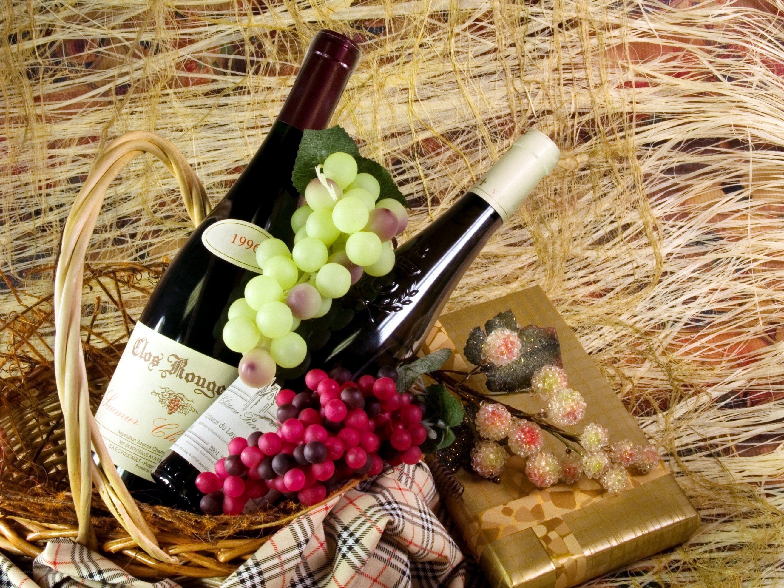 Wine and grapes in basket