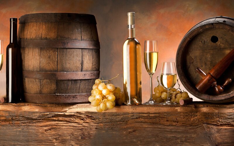 Wine barrel and grapes still life