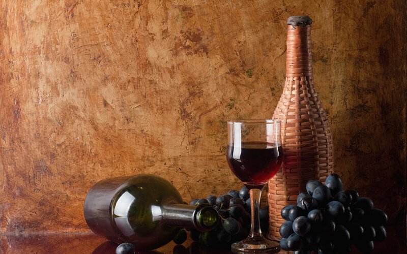 Wine Bottle and Grapes — Brown