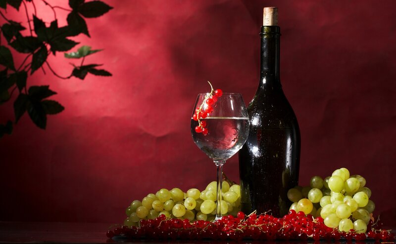 Wine Bottle with Grapes — Red, Dramatic, Photograph