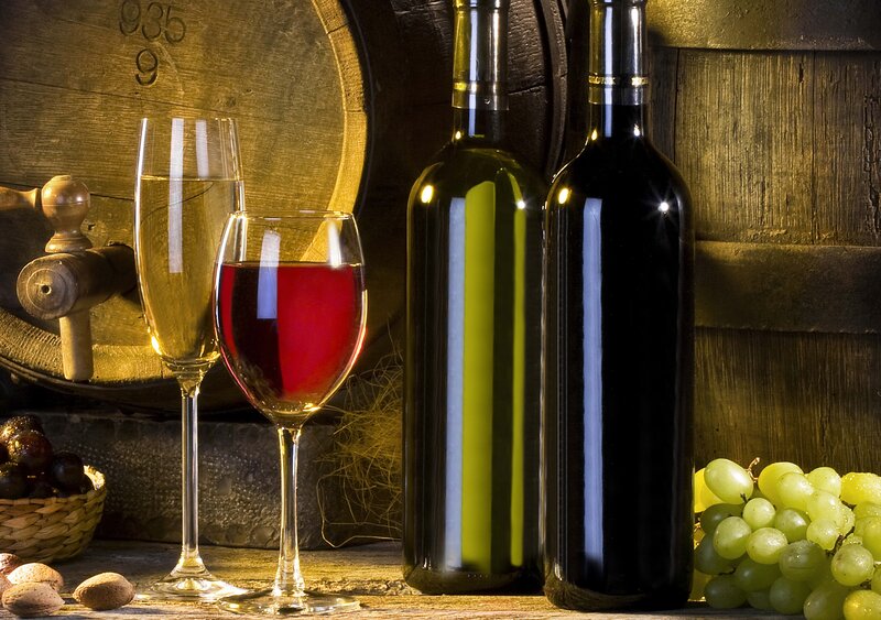 Wine bottles and glasses on table