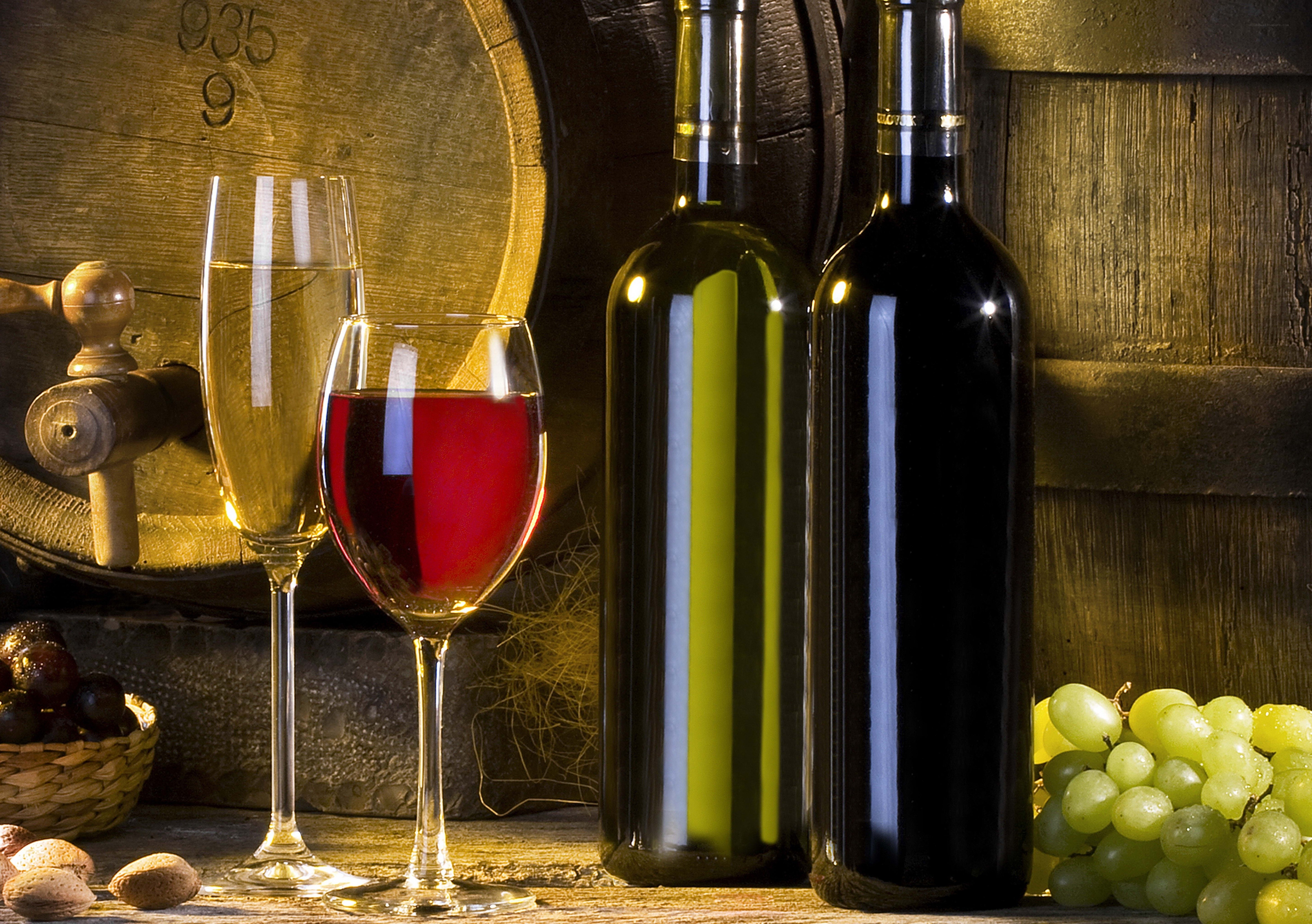 Wine bottles and glasses on table