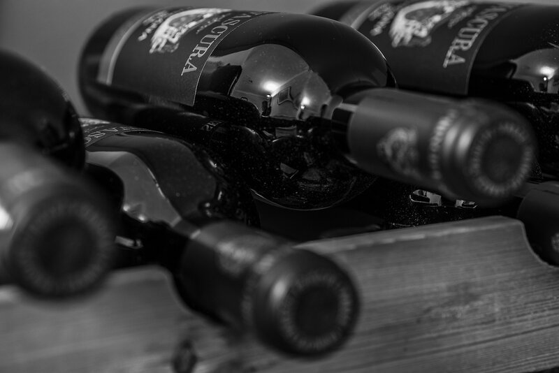 Wine Bottles in Rack — Black