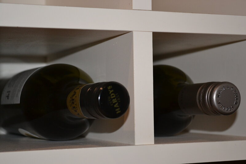 Wine Bottles in Shelf