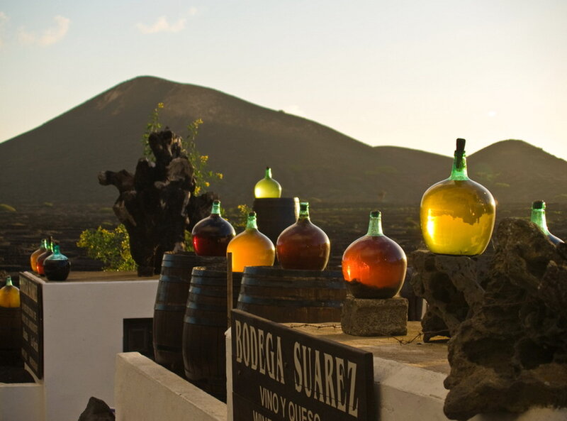 Wine Bottles on Barrels