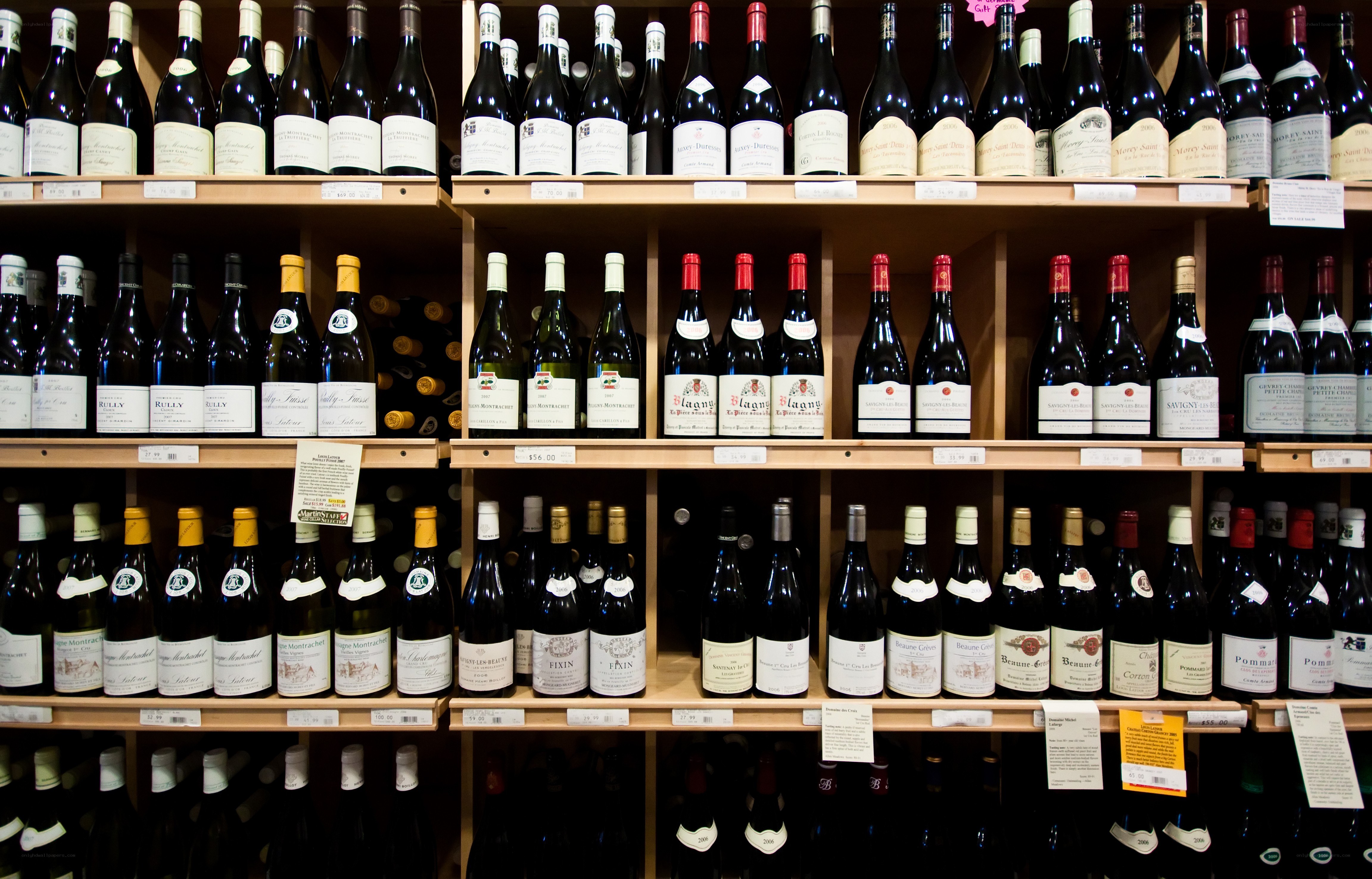 Wine bottles on store shelves