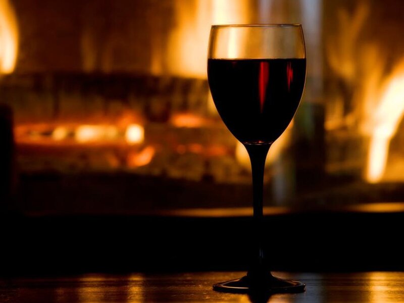 wine glass by fireplace
