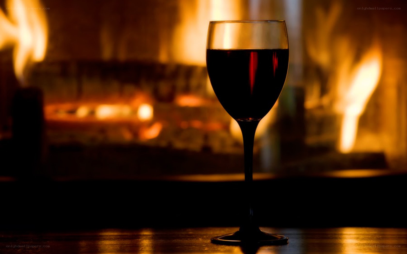 wine glass by fireplace