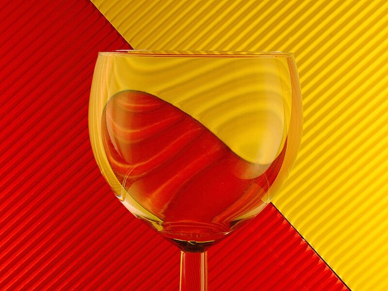 Wine Glass on Colored Background