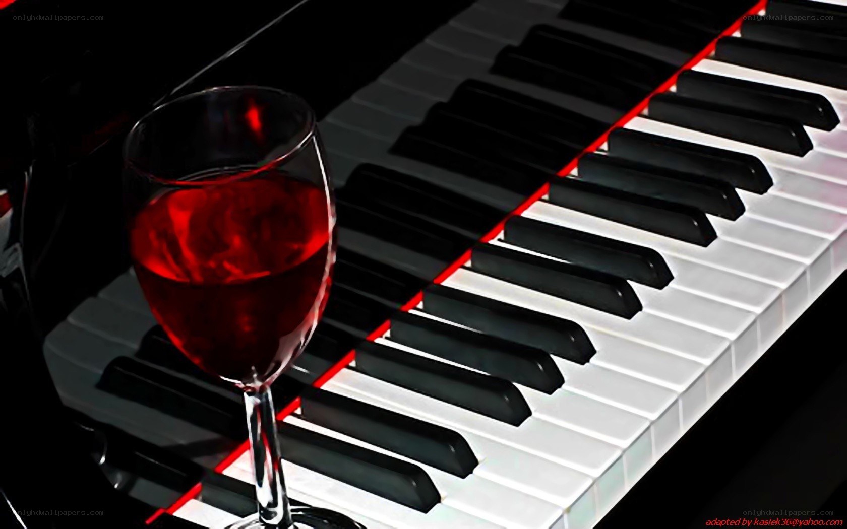 wine glass on piano keys