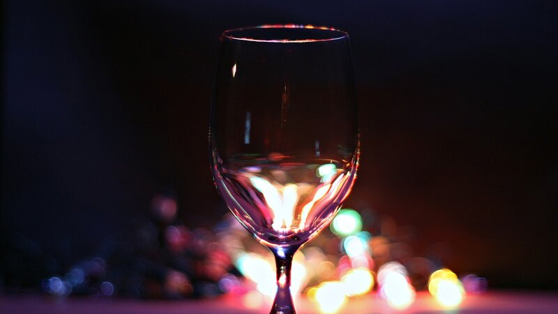 wine glass with bokeh lights