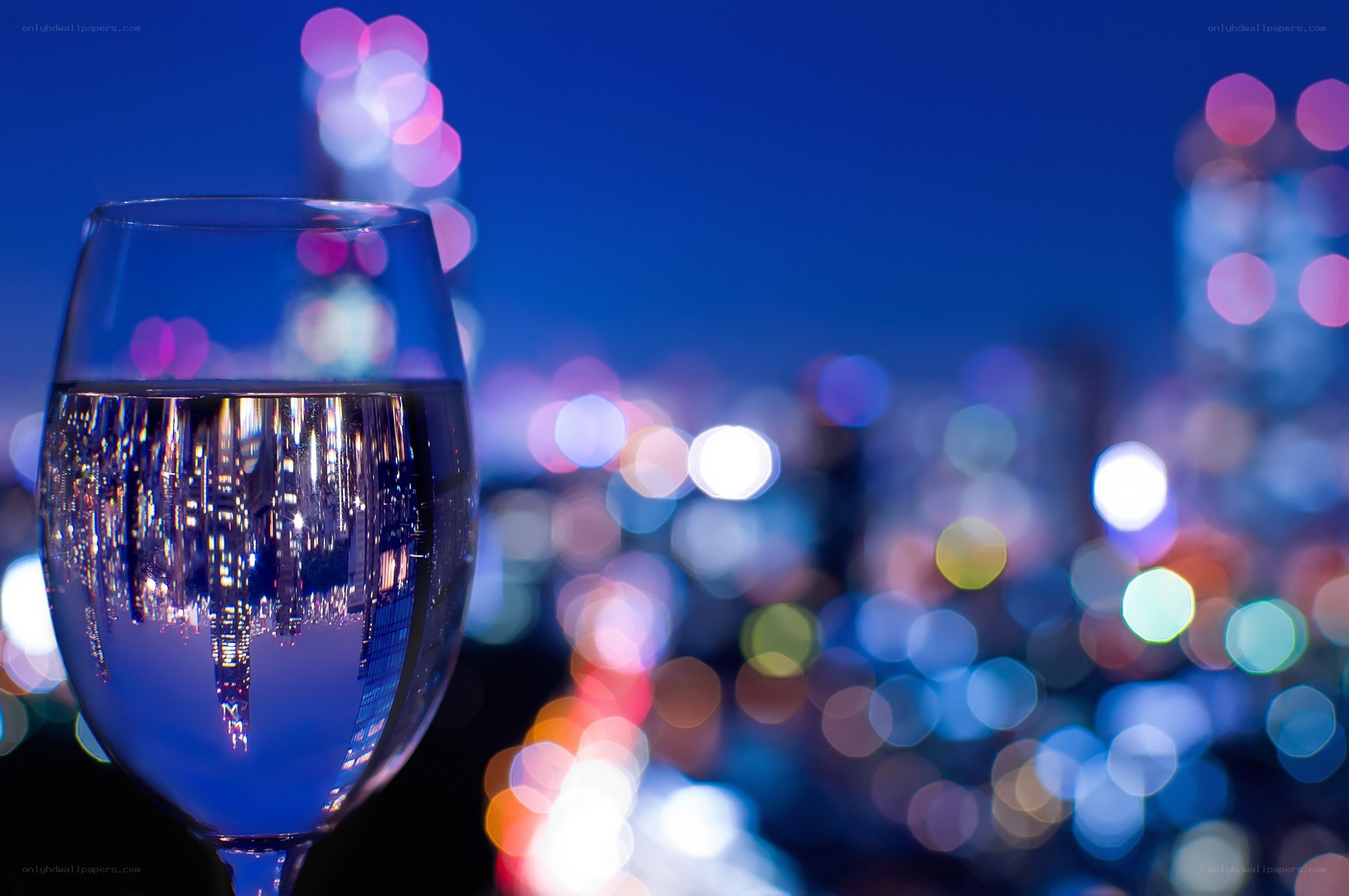 wine glass with city lights