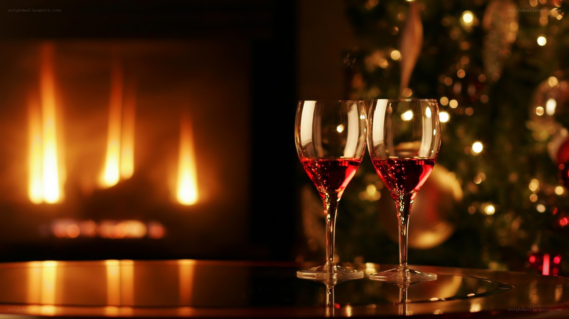Wine glasses by fireplace