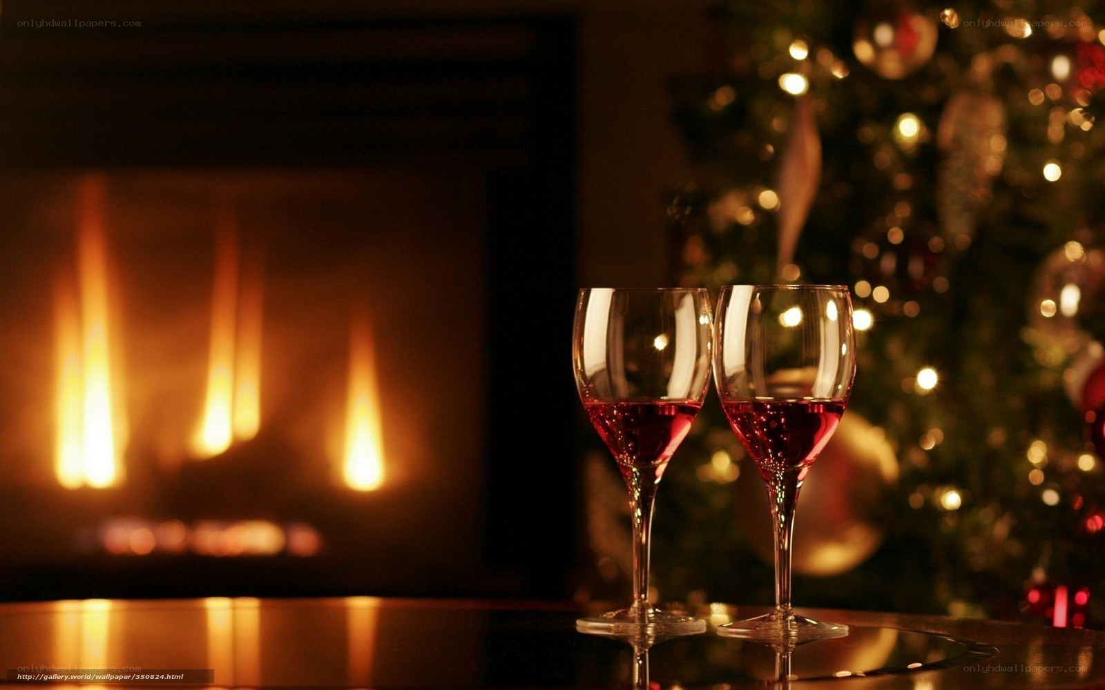 wine glasses by fireplace
