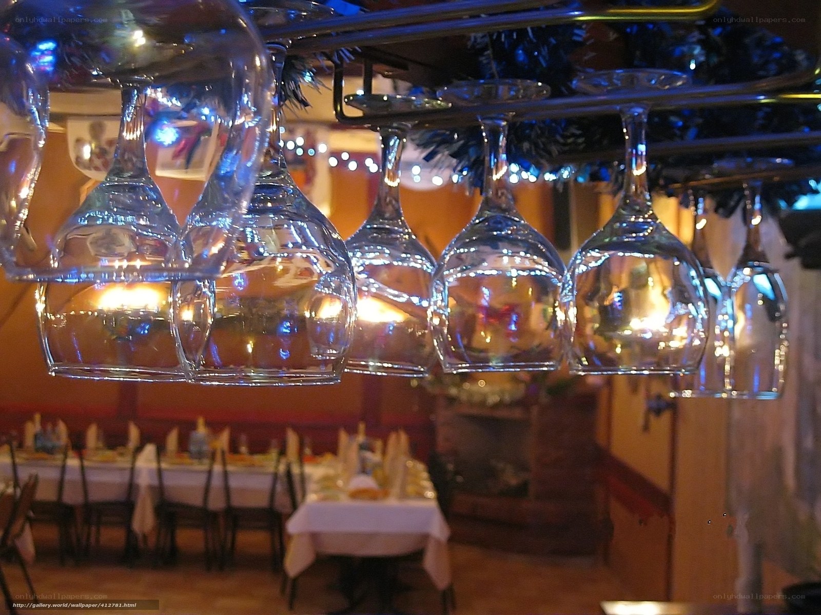 Wine glasses hanging in a restaurant