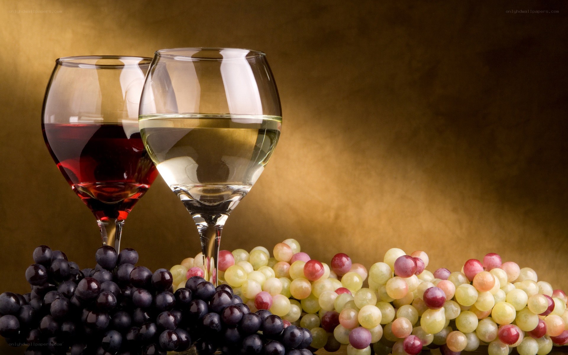 Wine glasses with grapes