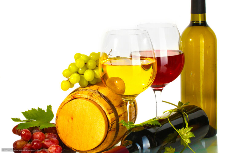 Wine glasses with grapes and barrel