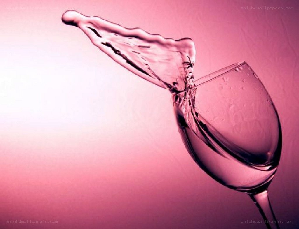 wine splashing in glass