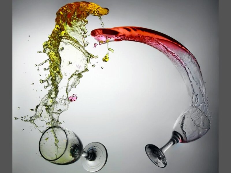 Wine Splashing in Glasses