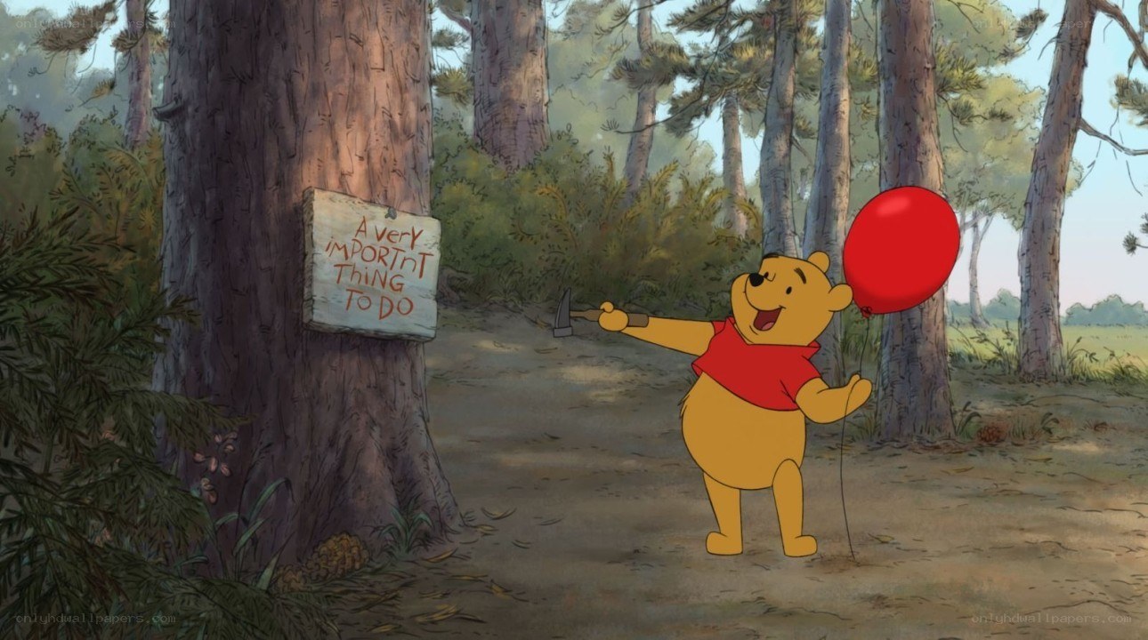 Winnie the Pooh with balloon