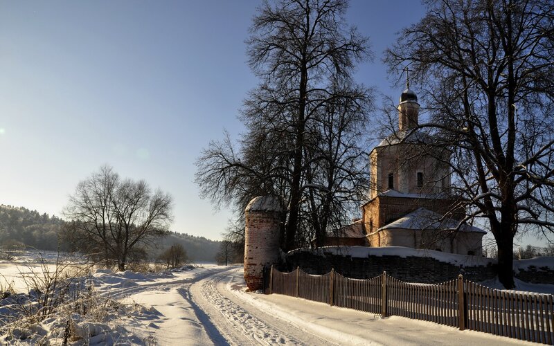 Winter church in snowy landscape
