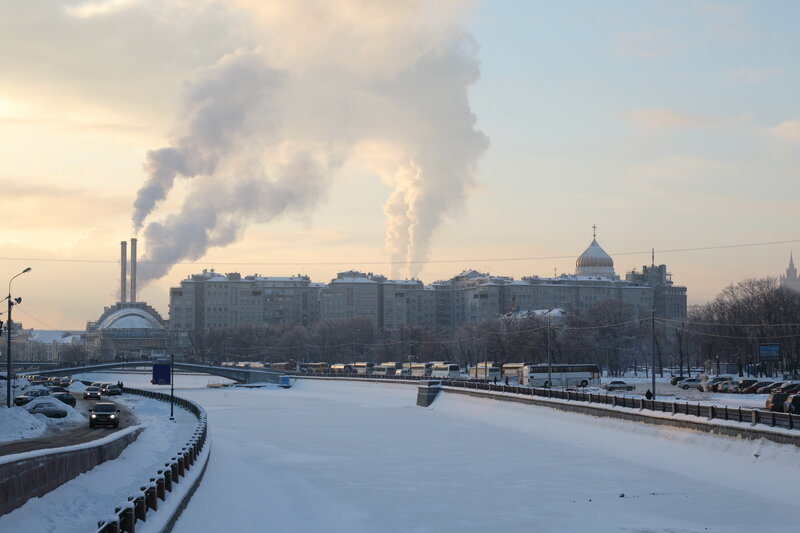 Winter city with smokestacks