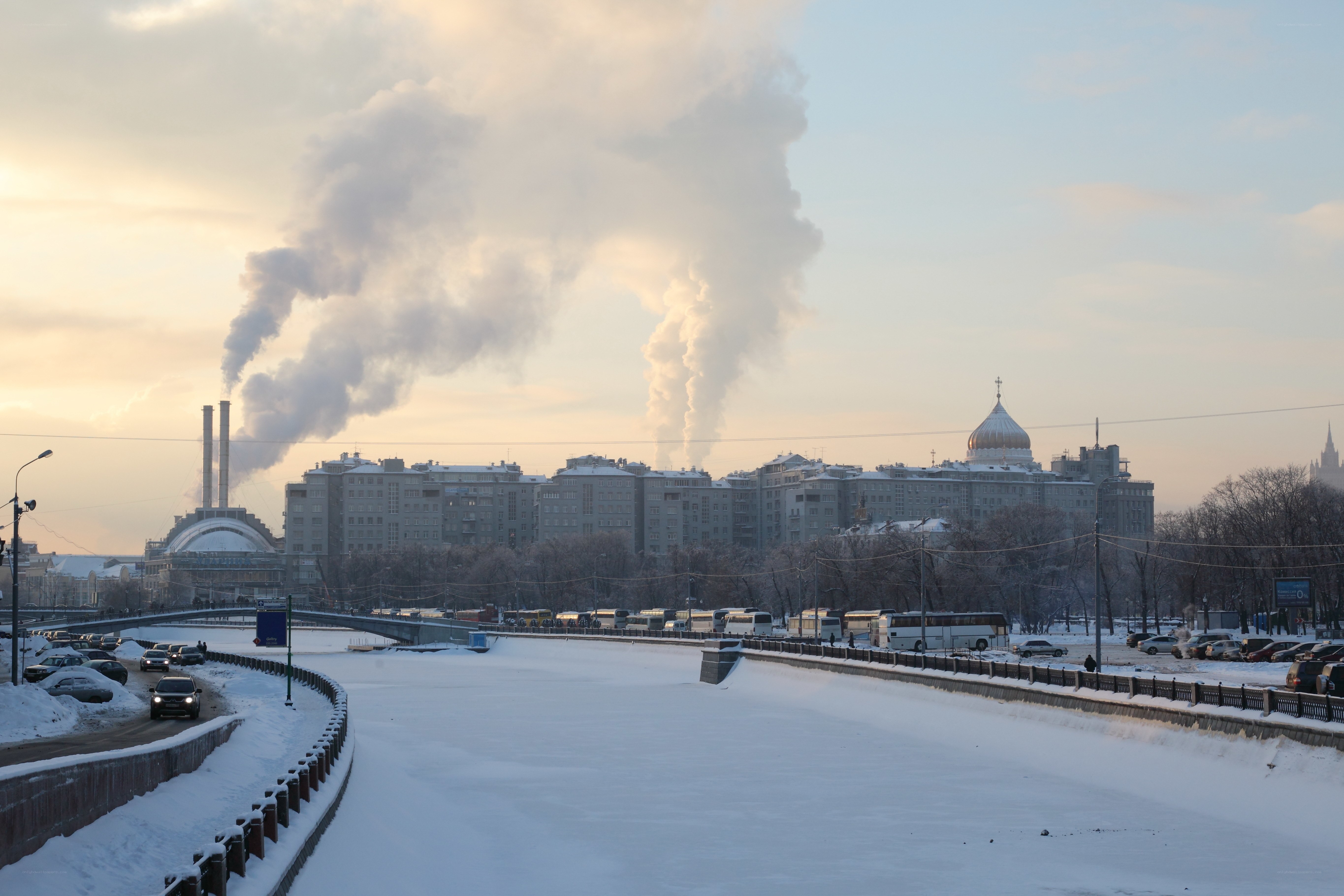 Winter city with smokestacks
