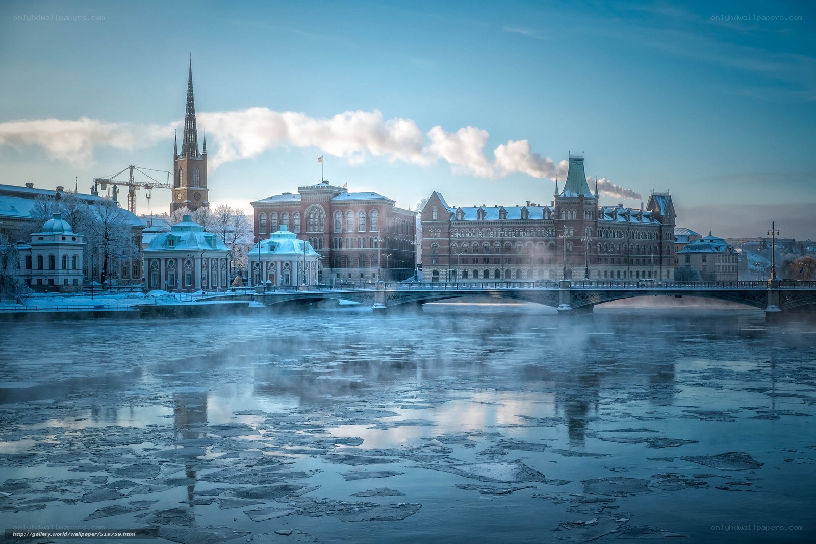 Winter cityscape with frozen river