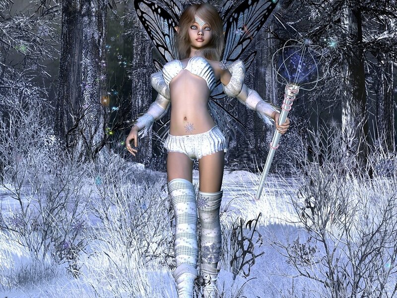 Winter fairy in snowy forest