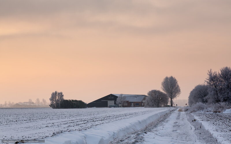 Winter farm at sunset
