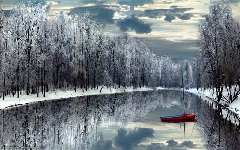 Winter forest with red boat