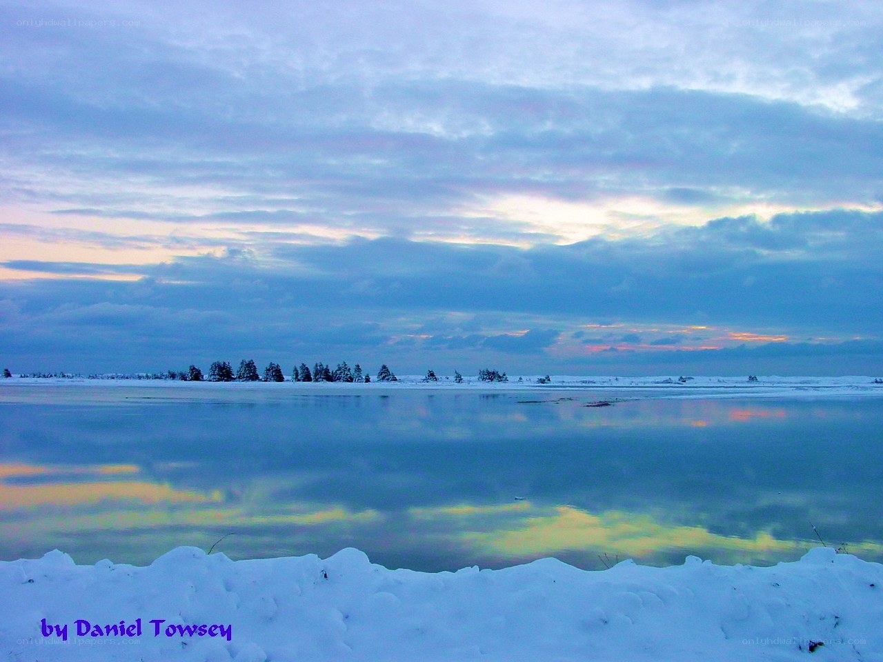 Winter lake at sunset