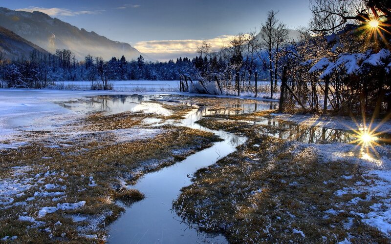 Winter landscape with stream